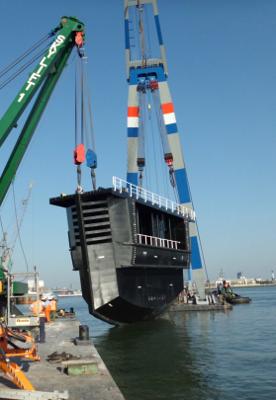 The caisson being floated after fabrication. [Photo:Babcock]